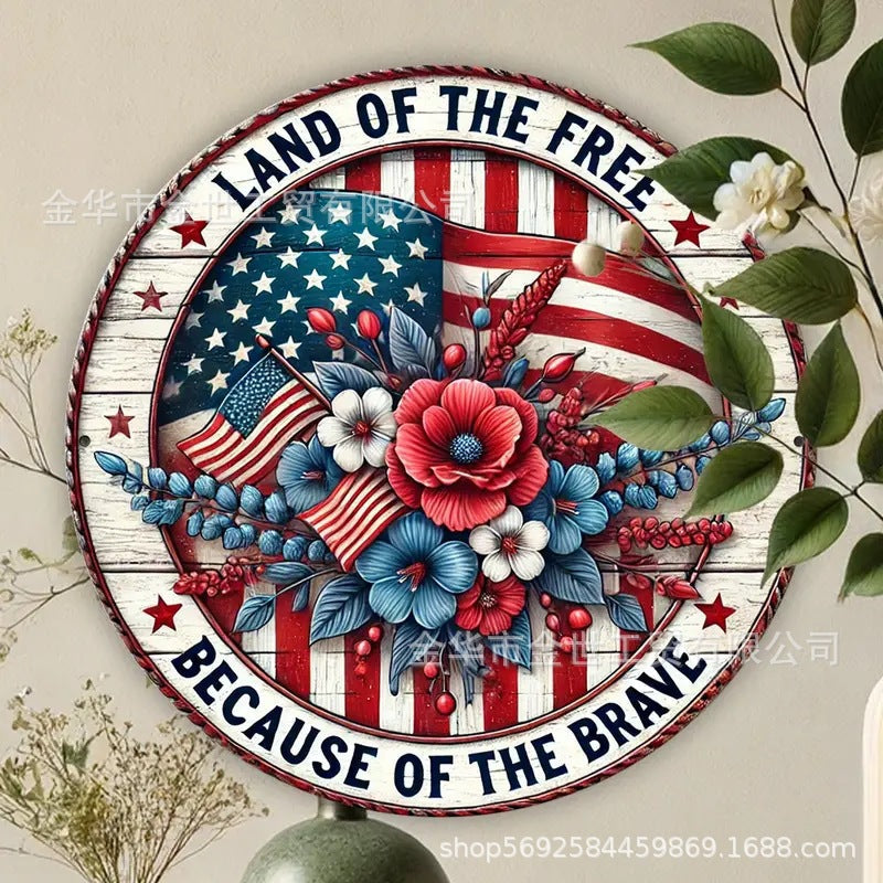 Independence Day rustic round wooden patriotic cross wall plaque with floral accents and God Bless America banner Kalsten