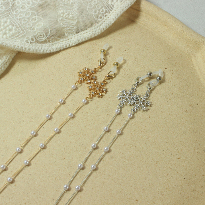 Elegant glasses holder chain with pearls and snowflake pendant Kalsten