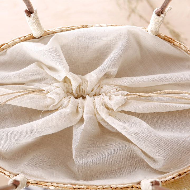 Elegant bast bag with flower appliqué Kalsten