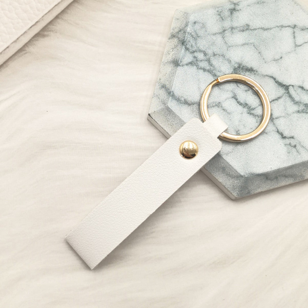 Unisex keychain made of high-quality synthetic leather with elegant metal embellishment Kalsten
