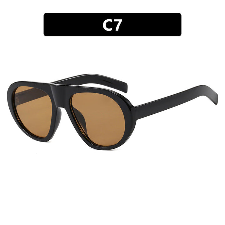 Women striking sunglasses with futuristic frame and sturdy design Kalsten