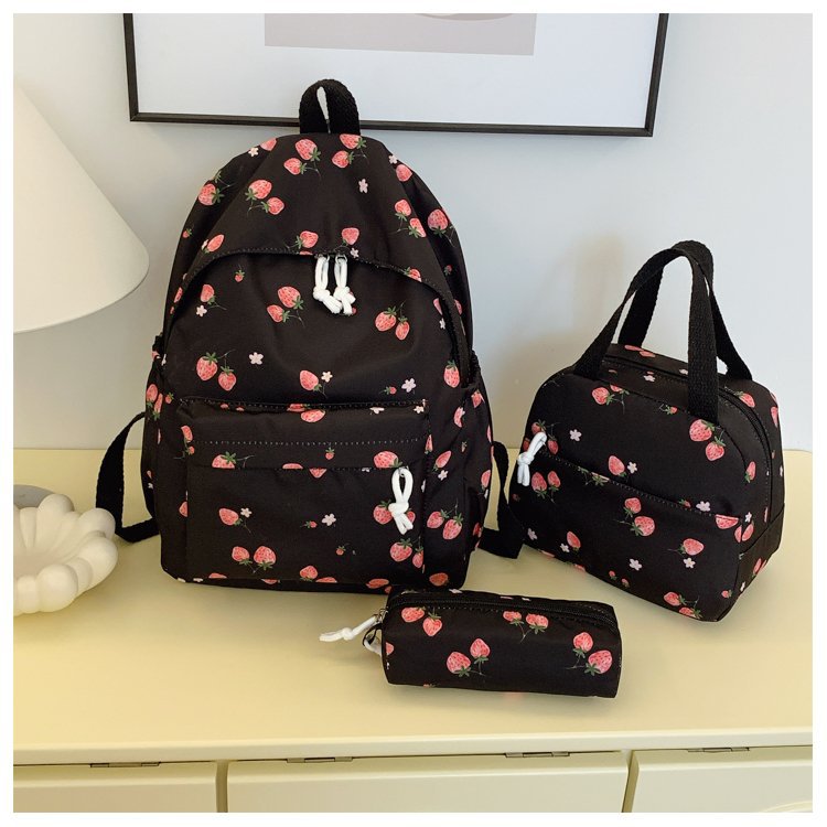Backpack set with cheerful strawberry pattern and practical compartments Kalsten