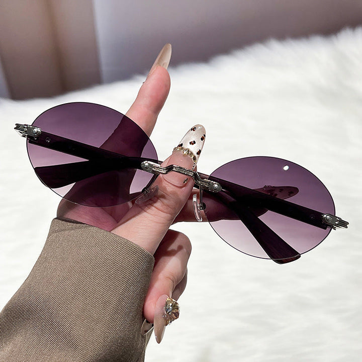 Ladies fashionable and elegant sunglasses with oval design Kalsten