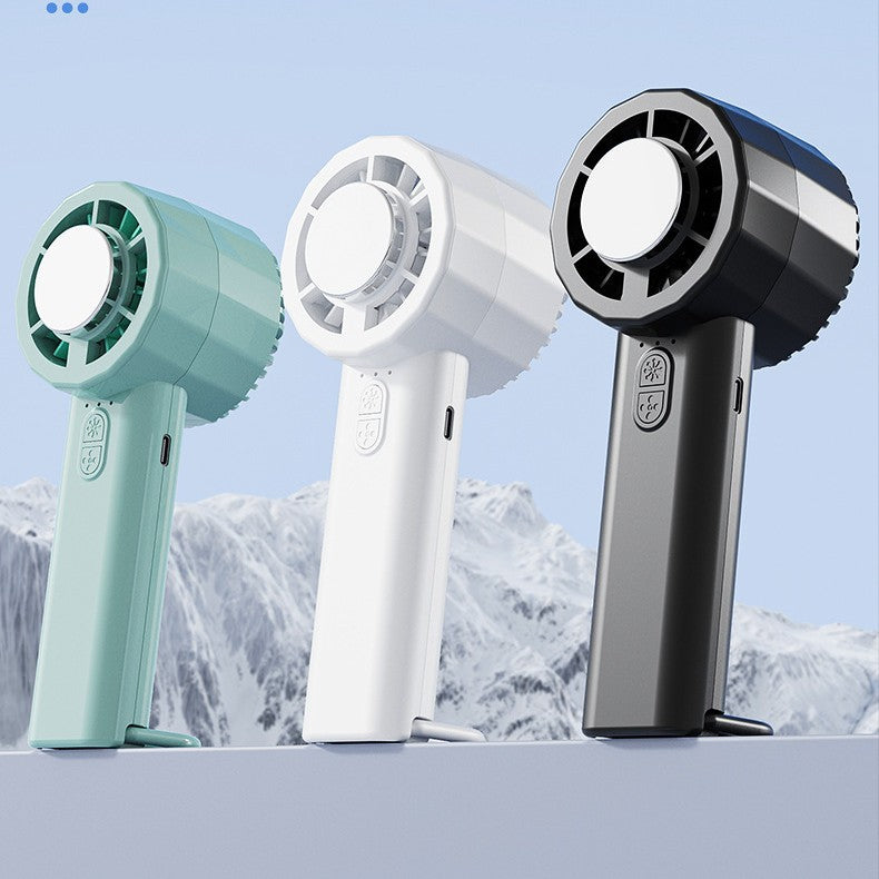Unisex portable mini hand fan with USB-C charging port and integrated mist spray function Kalsten