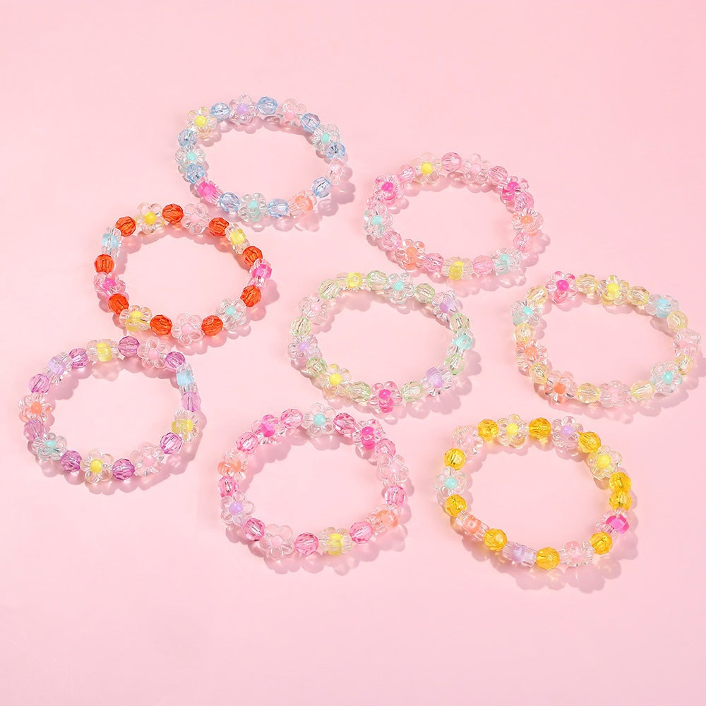 Friendship bracelet with colorful flower motifs Kalsten