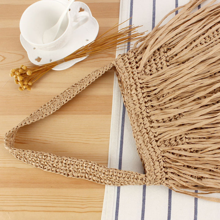 Braided summer handbag with fringed design Kalsten