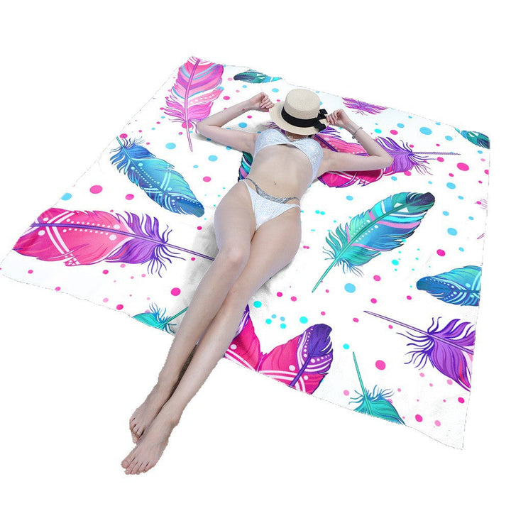 Beach blanket with vibrant floral pattern and innovative structure Kalsten