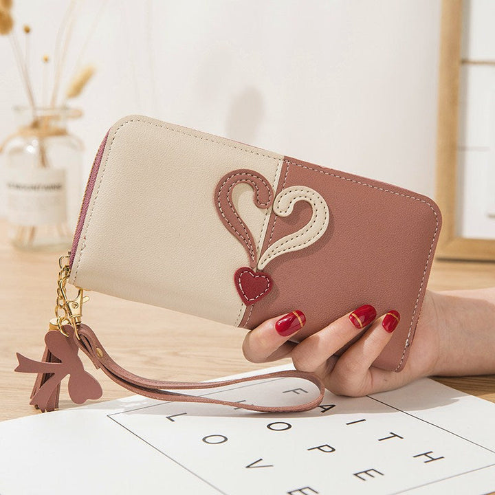 Stylish wallet with heart appliqués Kalsten