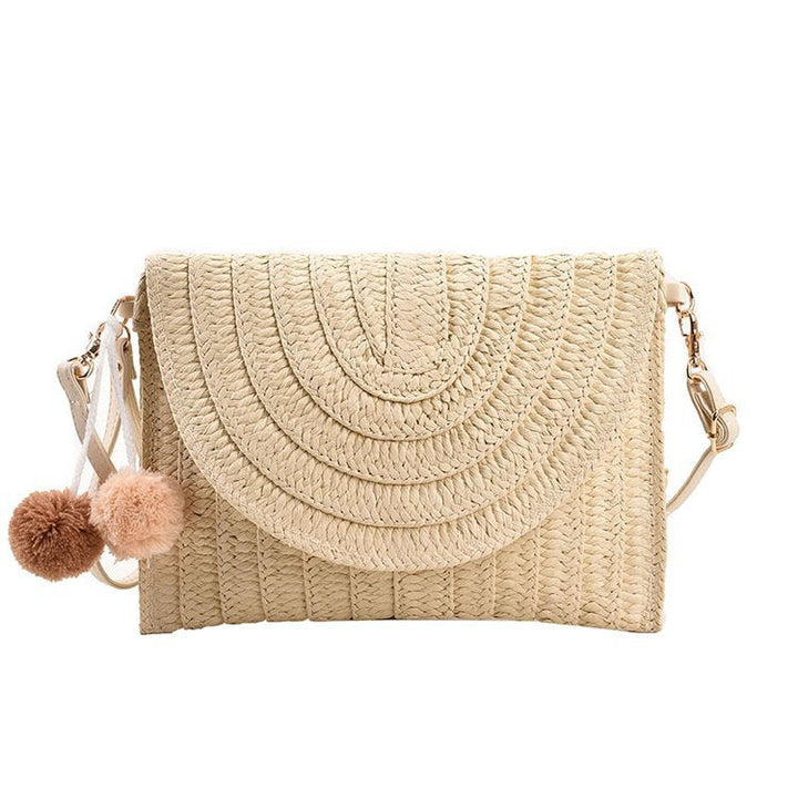 Braided shoulder bag with creative pom poms Kalsten