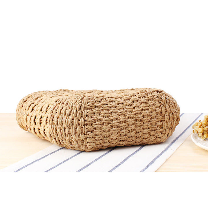 Braided handbag made of natural raffia with robust carrying straps Kalsten