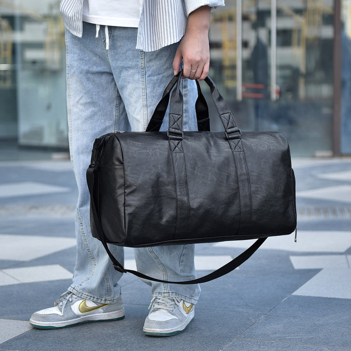Travel bag made of high-quality leather with robust carrying handles Kalsten