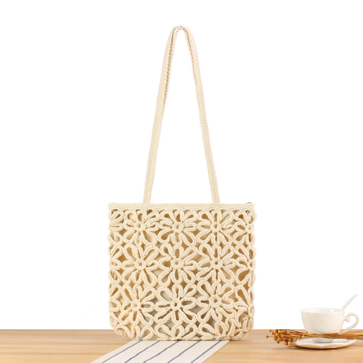Handbag made of artistic macramé with floral details Kalsten