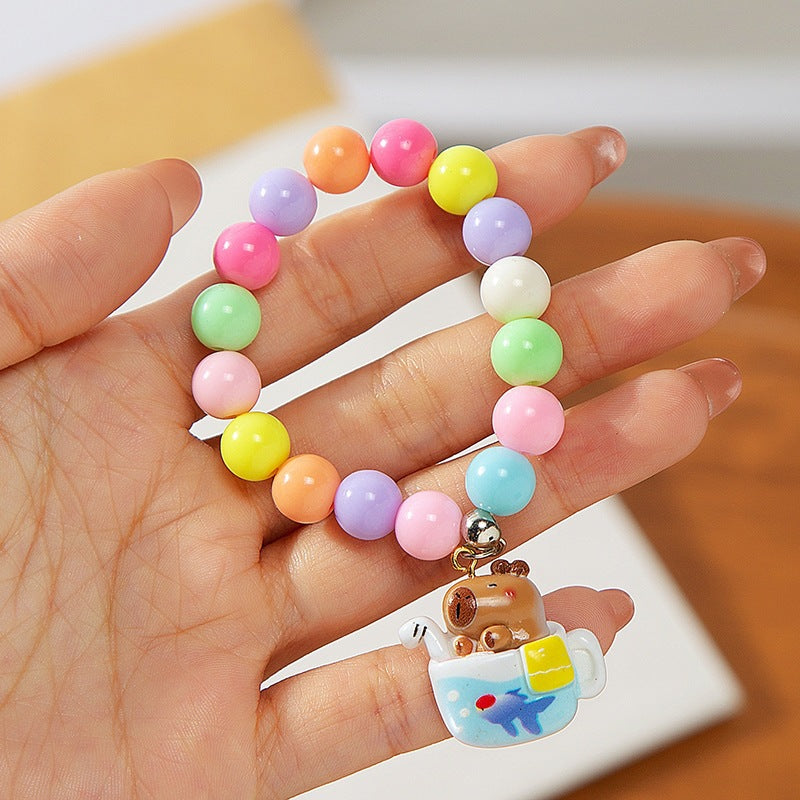 Colorful children's bracelet with crafted pendant Kalsten