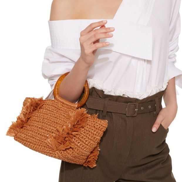 Handmade raffia shoulder bag with fringed accents Kalsten