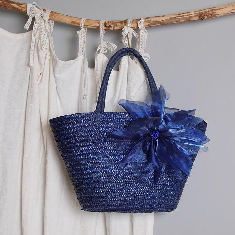 Stylish basket bag with eye-catching flower detail Kalsten