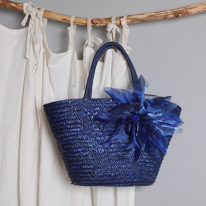 Stylish basket bag with eye-catching flower detail Kalsten