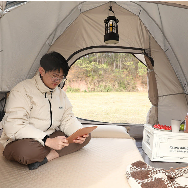double connectable inflatable camping mattress with integrated dual pillows, egg-crate comfort surface and compact carry sack Kalsten