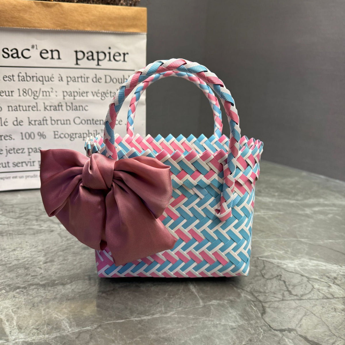 Playful basket bag with bow Acalora