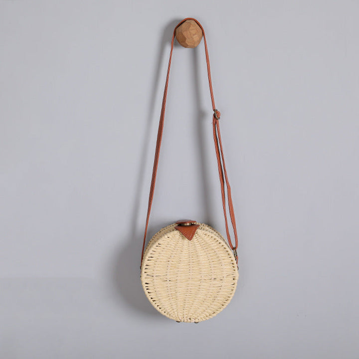 Round basket bag with leather accents Kalsten