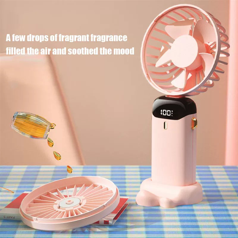 Unisex one size foldable rechargeable handheld fan with LED battery status indicator and detachable charging station Kalsten