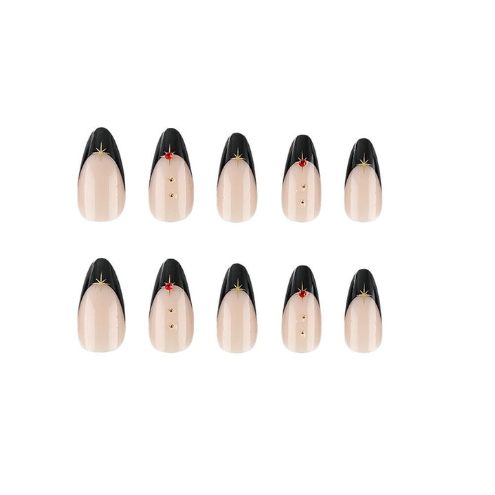 Glamorous artificial nails in stylish stiletto design with golden accents Kalsten