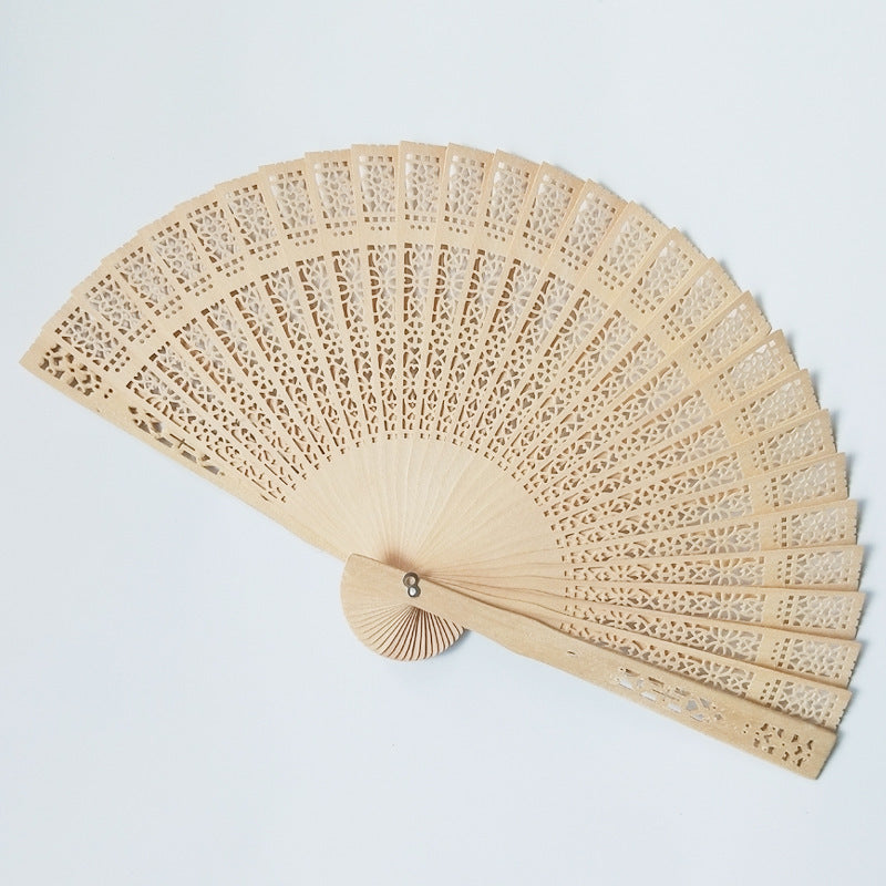 Ladies decorative and high-quality hand fan made of filigree wood Kalsten