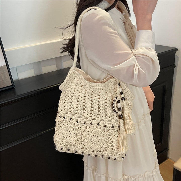 Macrame Drawstring Bag with Playful Tassels and Furniture Structure Kalsten