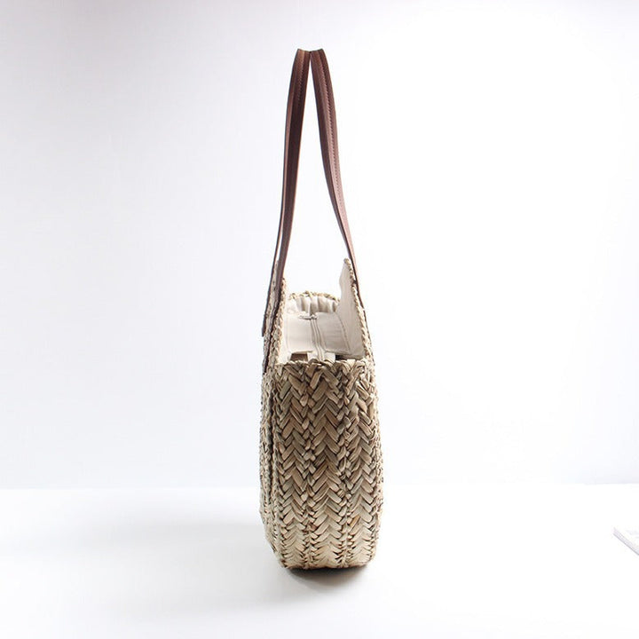 Braided straw beach bag with elegant leather handles Kalsten