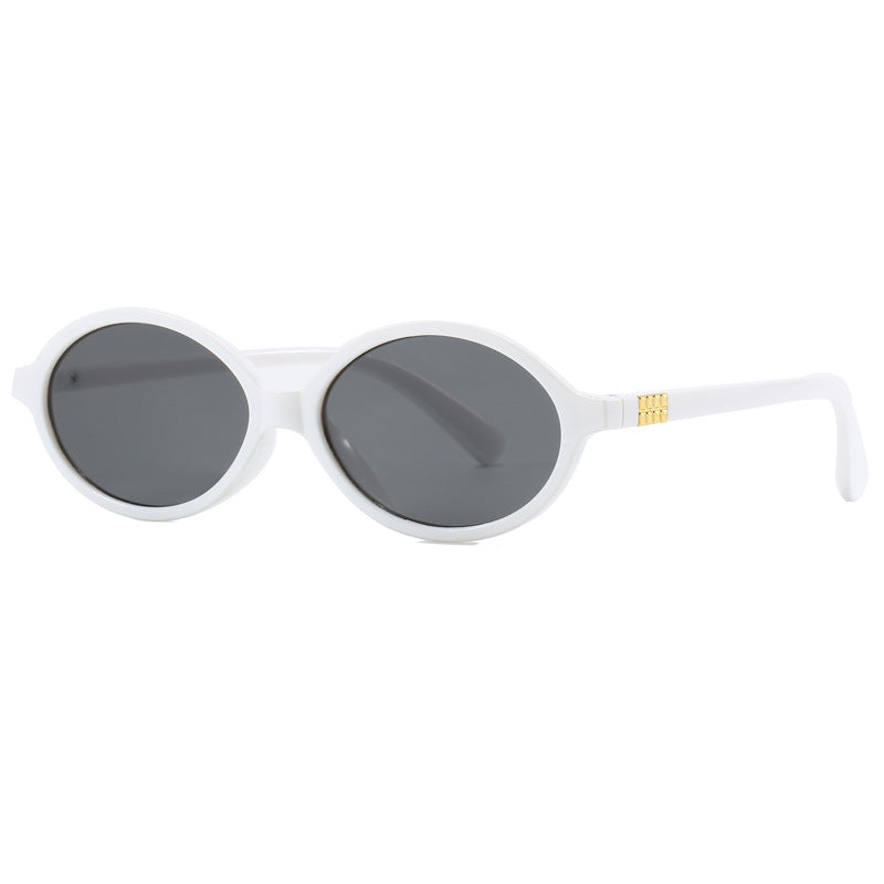 Women's fashionable sunglasses with oval frame and golden accents Kalsten