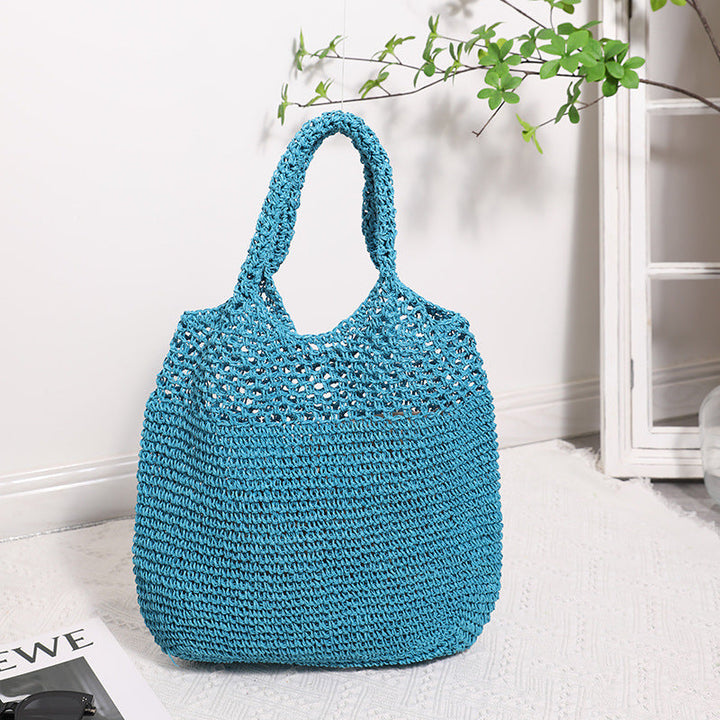 Handcrafted straw bag with wide carrying handle Kalsten