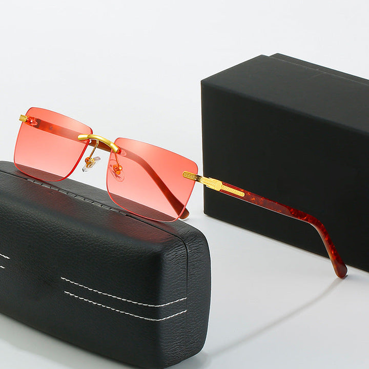 Women's fashionable sunglasses with a stylish, rectangular frame and elegant metal accents Kalsten