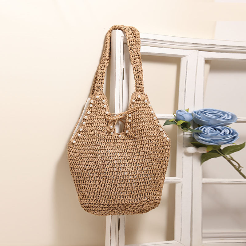 Handbag with pearl decor and innovative closure Kalsten