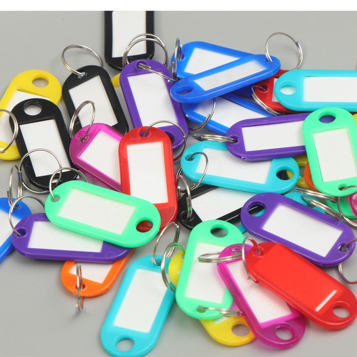 Unisex writable keychain with clear labeling field Kalsten