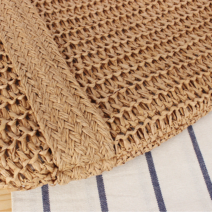 Eco-friendly straw tote bag with elegant tassel detail Kalsten
