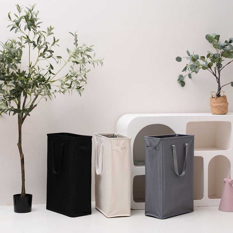 Elegant laundry basket with practical carrying handle Kalsten