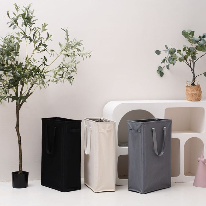 Elegant laundry basket with practical carrying handle Kalsten