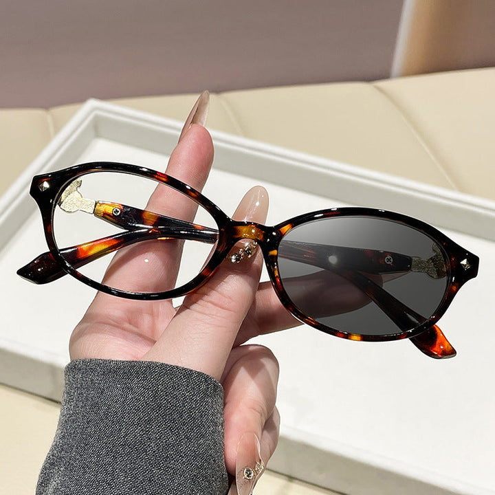Women's fashionable optical glasses in elegant oval design with golden accents Kalsten