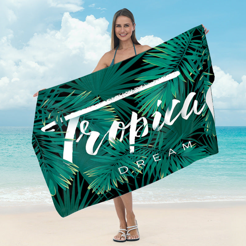 Beach towel with tropical leaf design Kalsten
