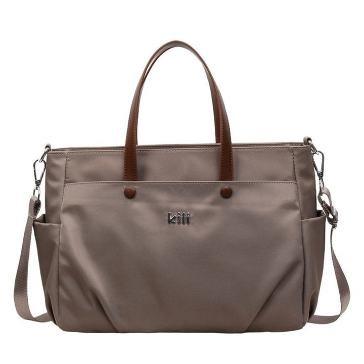 Shopping bag with comfortable carrying system and practical outer pockets Kalsten