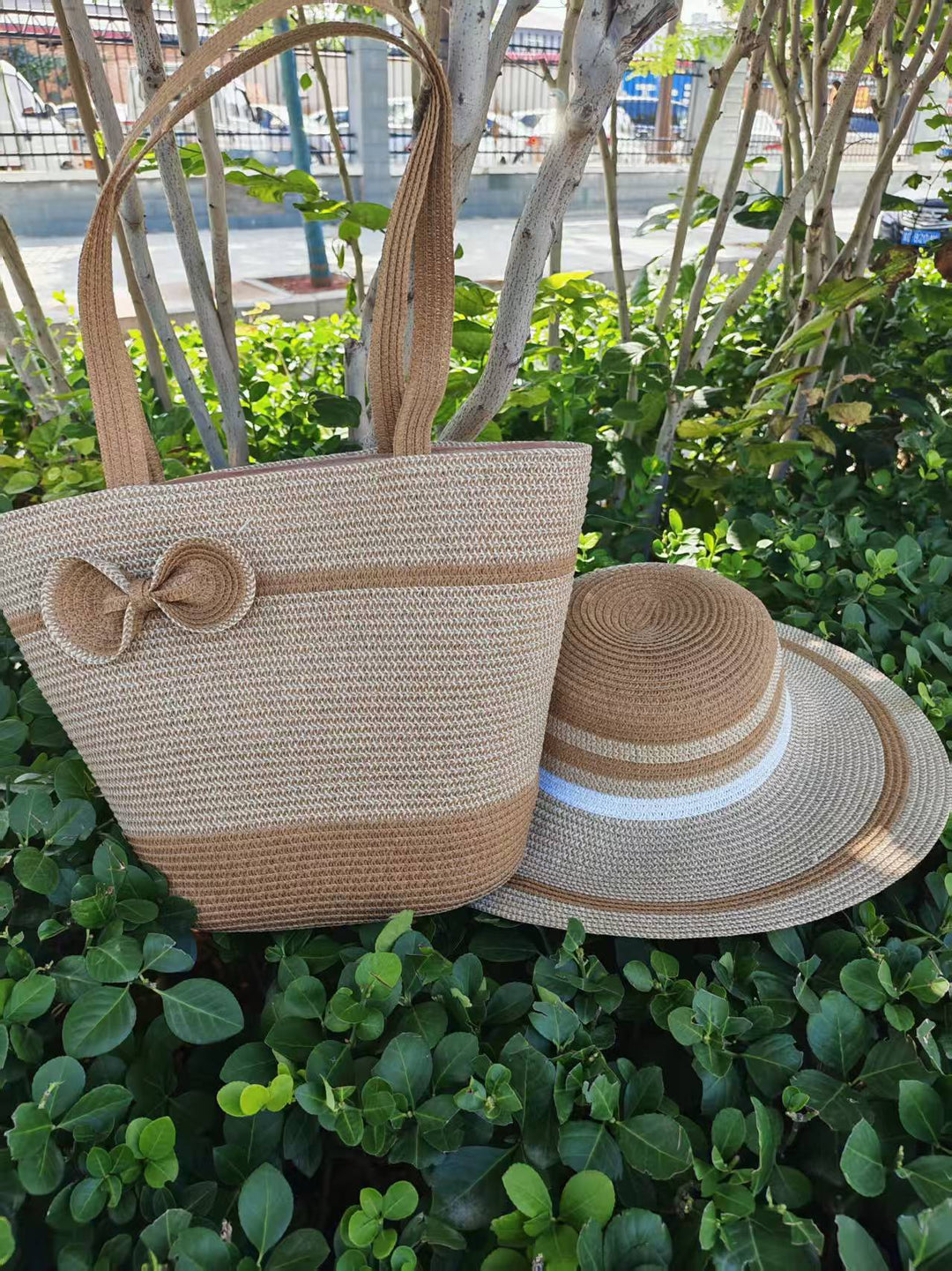 Elegant sun hat with wide brim and subtle stripe pattern Kalsten