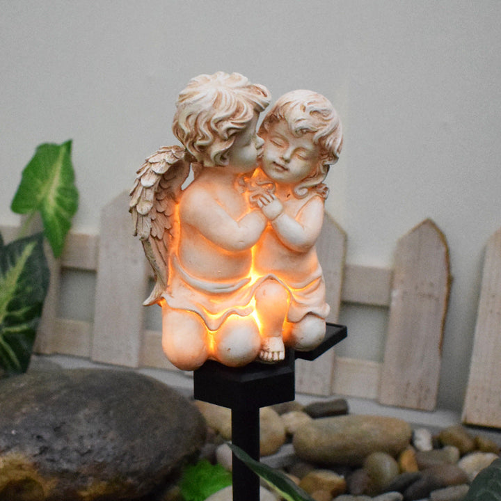 Decorative Solar Garden Stake Statue Resin Girl Figurine With Integrated Solar LED And Weatherproof Spike Kalsten