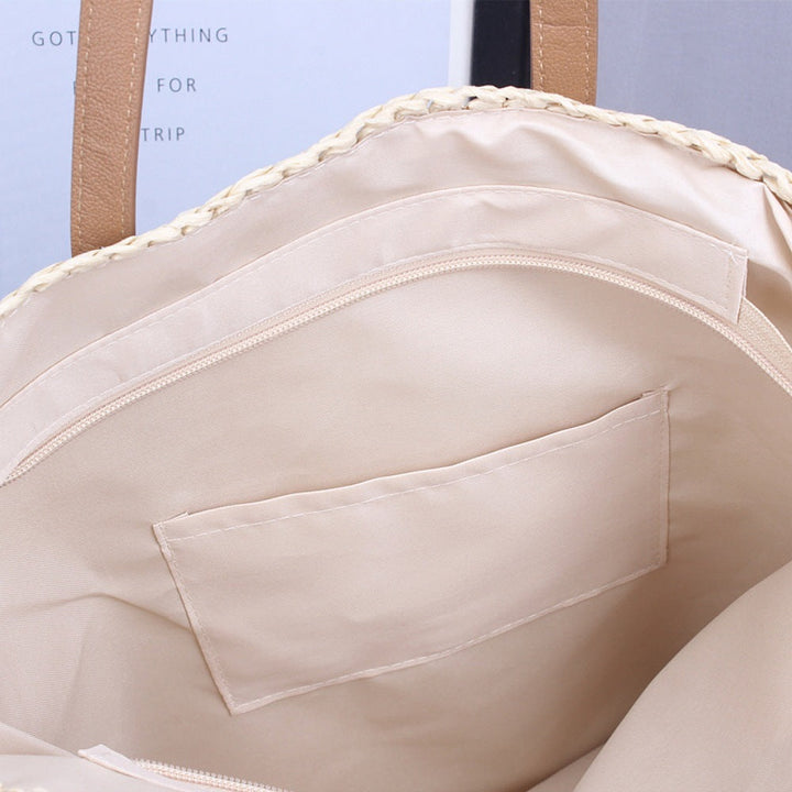 Handwoven beach bag made of natural materials with leather accents Kalsten