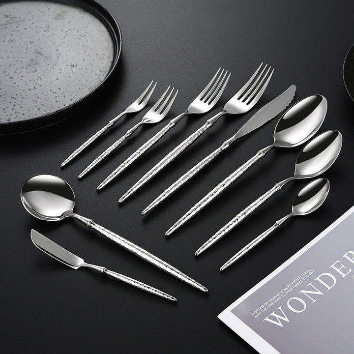 Elegant soup spoon with structured handle Kalsten