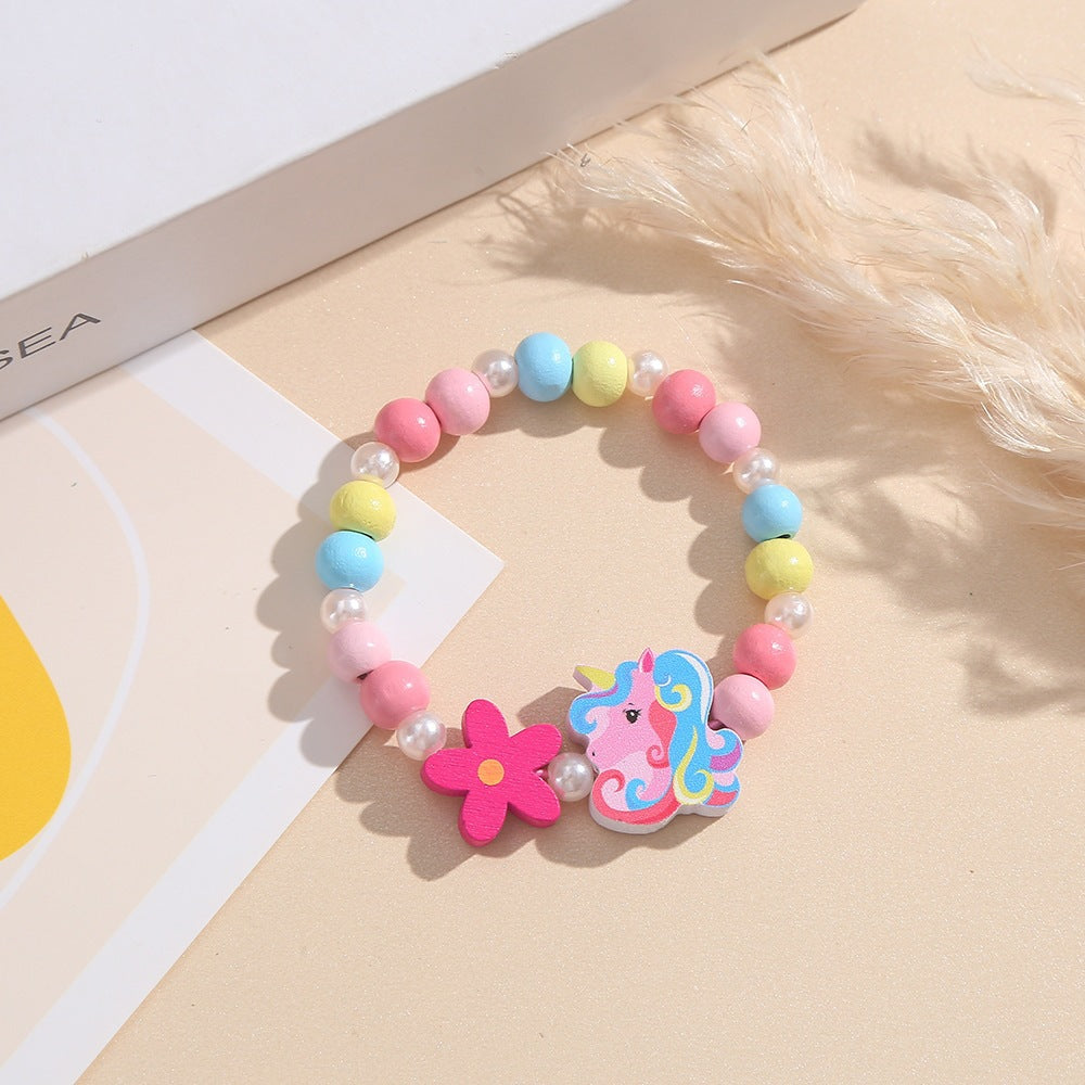 Playful children's bracelet with unicorn and flower motif Kalsten