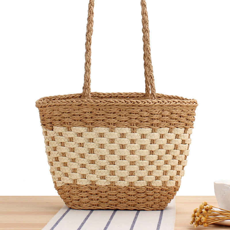 Braided handbag made of natural raffia with robust carrying straps Kalsten
