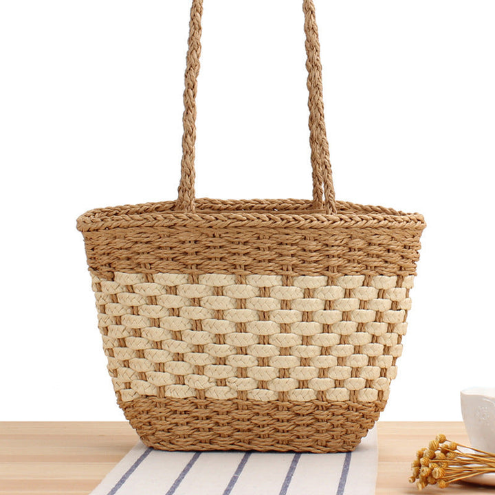 Braided handbag made of natural raffia with robust carrying straps Kalsten