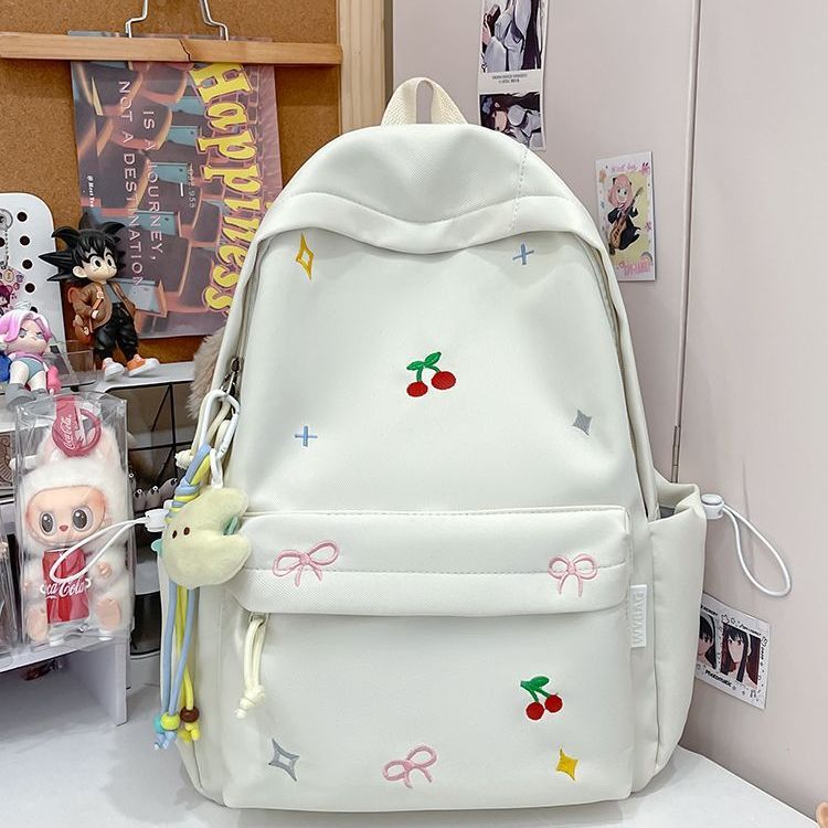 Playful backpack with embroidery Kalsten