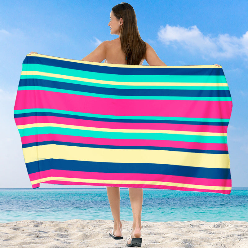 Beach towel with vibrant gradient color and stylish striped design Kalsten