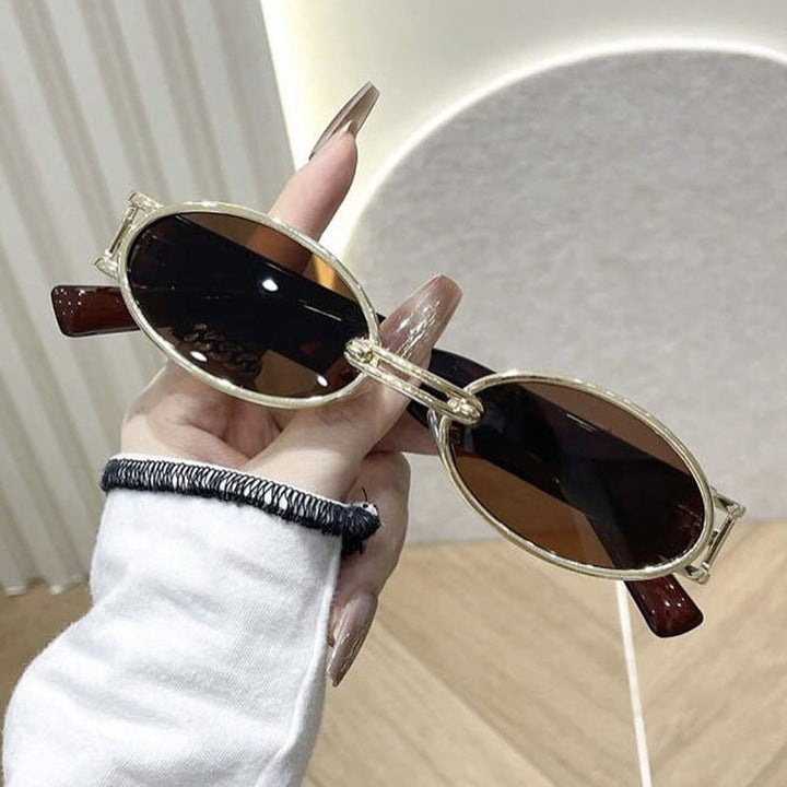 Women oval-shaped sunglasses with golden accents and stylish frame Kalsten