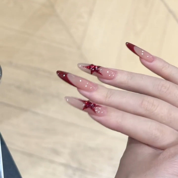 Fake nails with glitter star design Kalsten